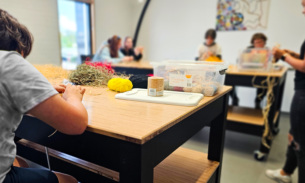 Image of young people using the Maker Space.